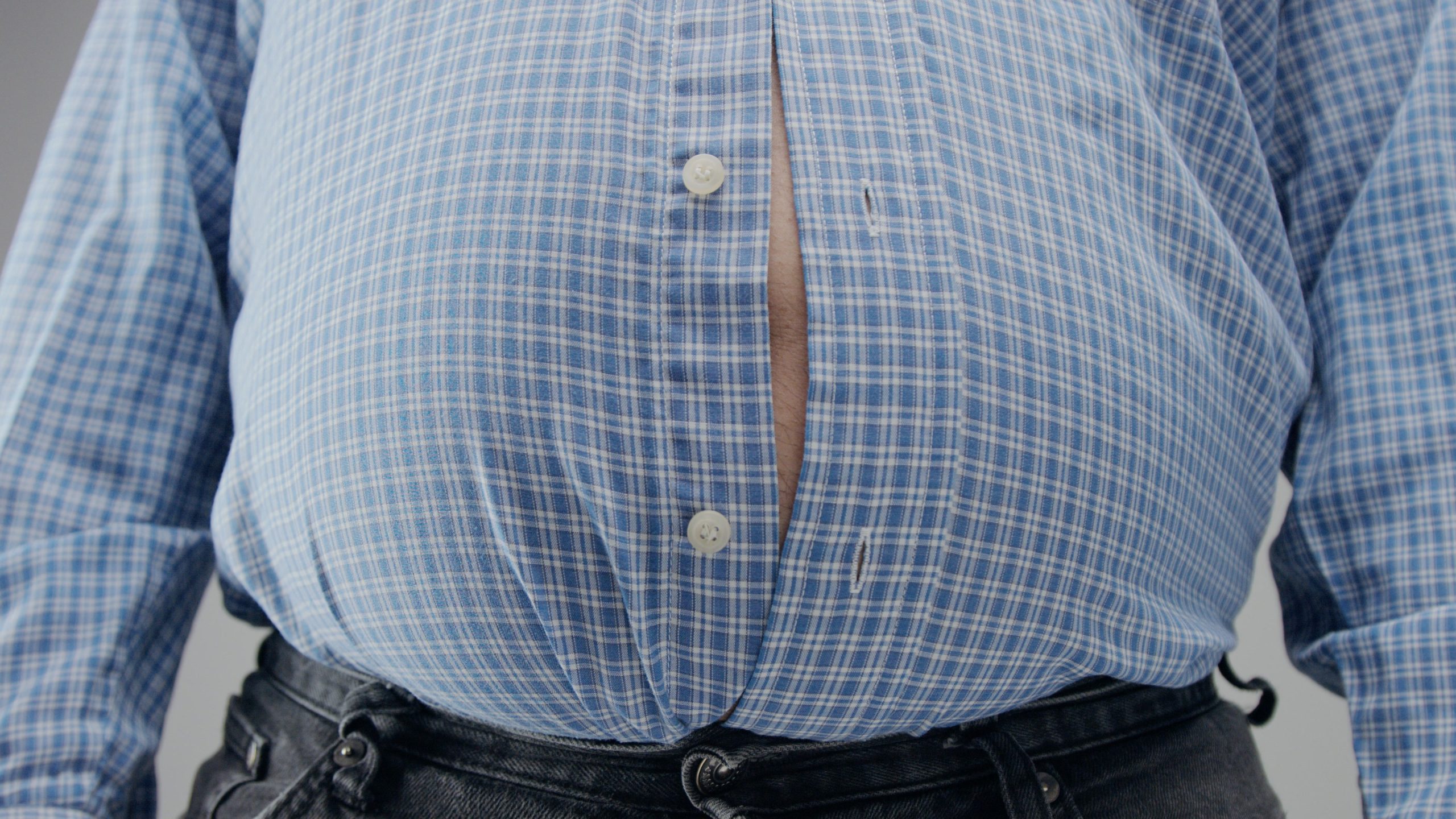 overweight man closeup of belly Diet concept. Fisheye belly closeup